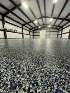 View of flooring to a garage, titan garage flooring solutoin tampa, flooring installation tampa, flooring tampa