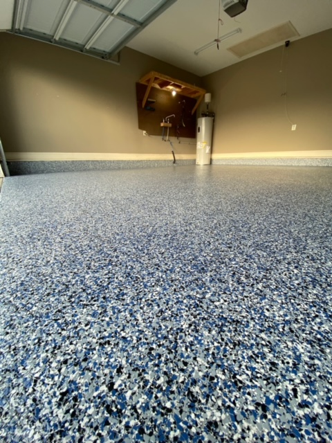 Completed Blue and White Flake Garage Flooring