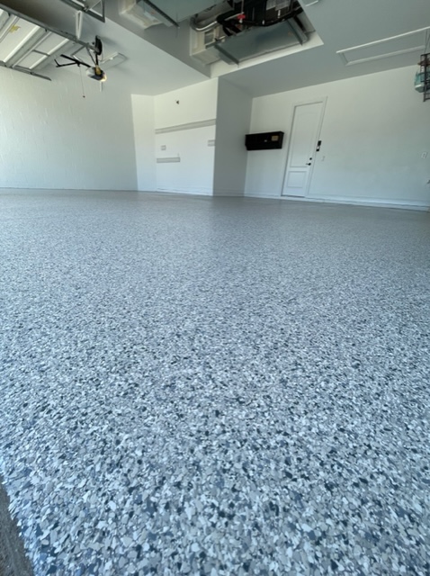 Completed Grey and Black Flake Garage Flooring